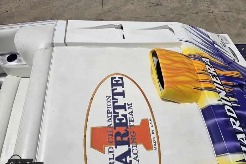 Slide: The Image of 2002 Cigarette 42' Tiger boat with vibrant graphics and racing team logo. - 53
