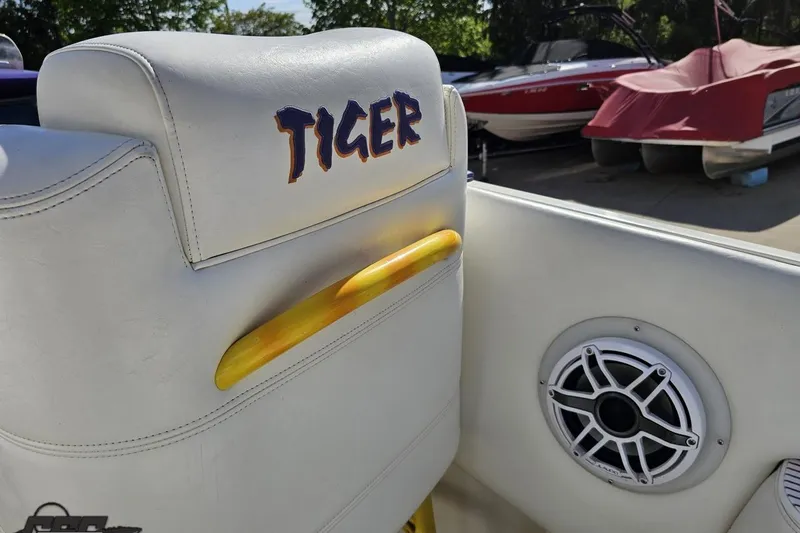 Slide: The Image of 2002 Cigarette 42' Tiger boat interior with speaker and "Tiger" logo. - 57