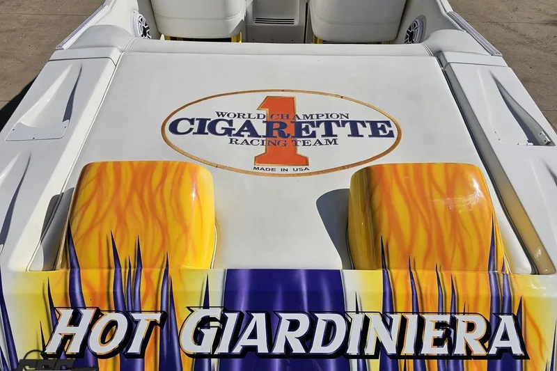 Slide: The Image of 2002 Cigarette 42' Tiger boat with vibrant "Hot Giardiniera" design and racing team logo. - 44