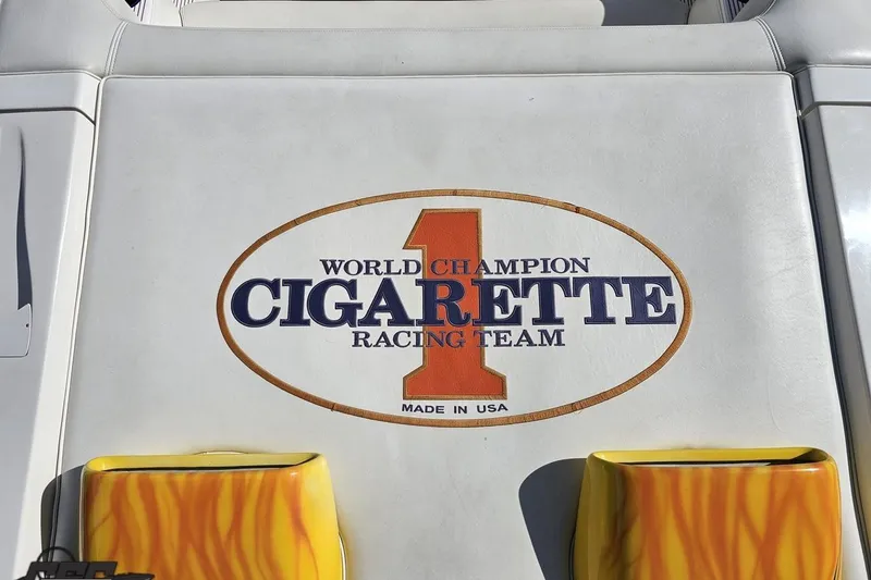 Slide: The Image of 2002 Cigarette 42' Tiger boat with "World Champion Cigarette Racing Team" logo. - 47