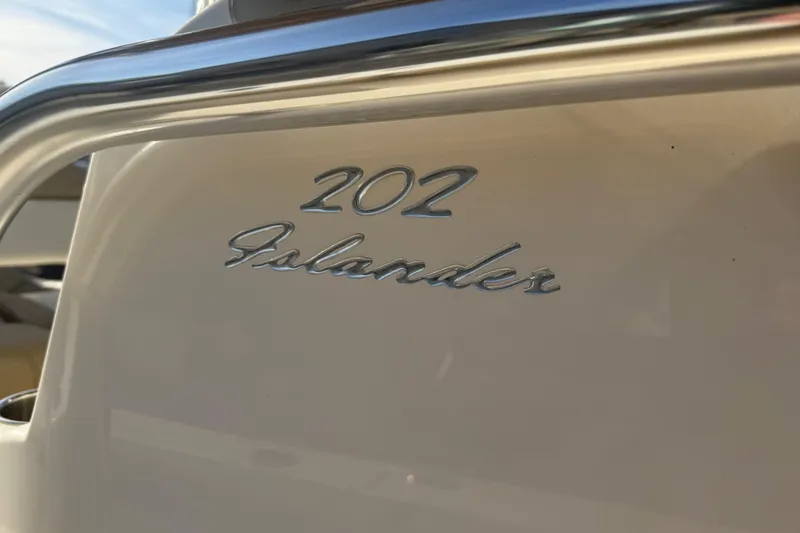 Slide: The Image of Close-up of 2021 Pioneer 202 Islander boat model nameplate. - 45