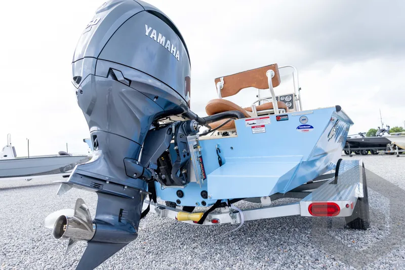 Slide: The Image of 2026 G3 Bay 19 GX boat with Yamaha outboard motor on a trailer. - 11