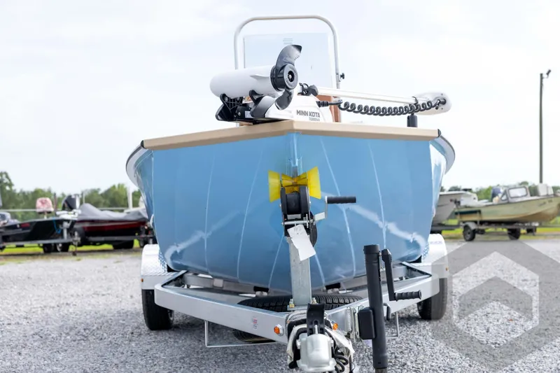 Slide: The Image of 2026 G3 Bay 19 GX boat on trailer, featuring Minn Kota trolling motor. - 1