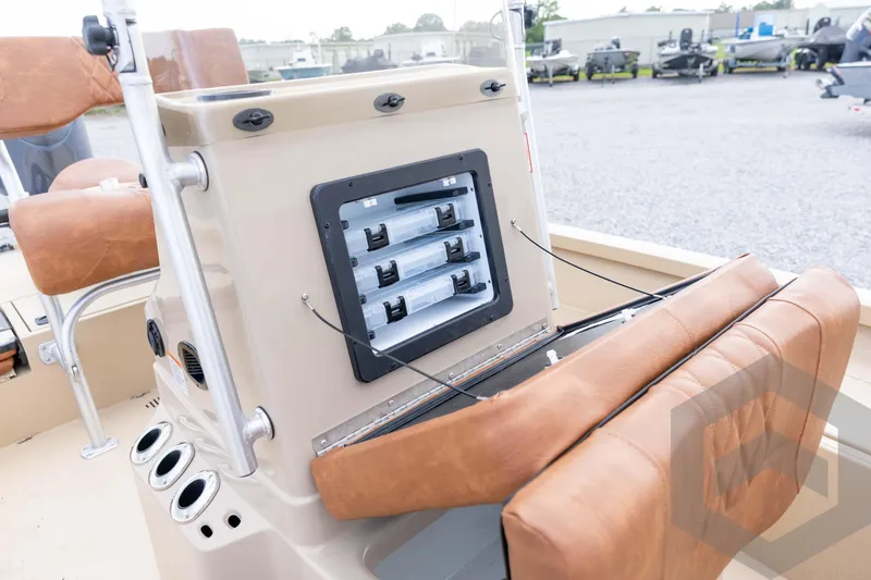 Slide: The Image of 2026 G3 Bay 19 GX boat interior with storage compartments and cushioned seating. - 22
