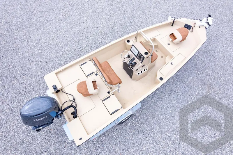 Slide: The Image of 2026 G3 Bay 19 GX boat with Yamaha motor, beige interior, and dual seating. - 40