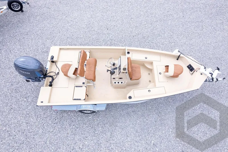 Slide: The Image of 2026 G3 Bay 19 GX boat with Yamaha motor, aerial view on gravel surface. - 39
