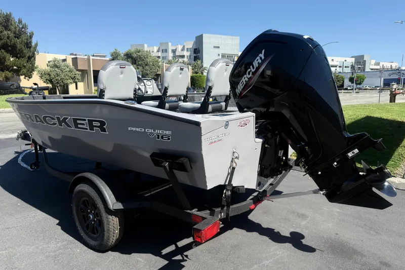 Slide: The Image of 2027 Tracker Pro Guide V-16 SC boat with Mercury engine on trailer. - 4