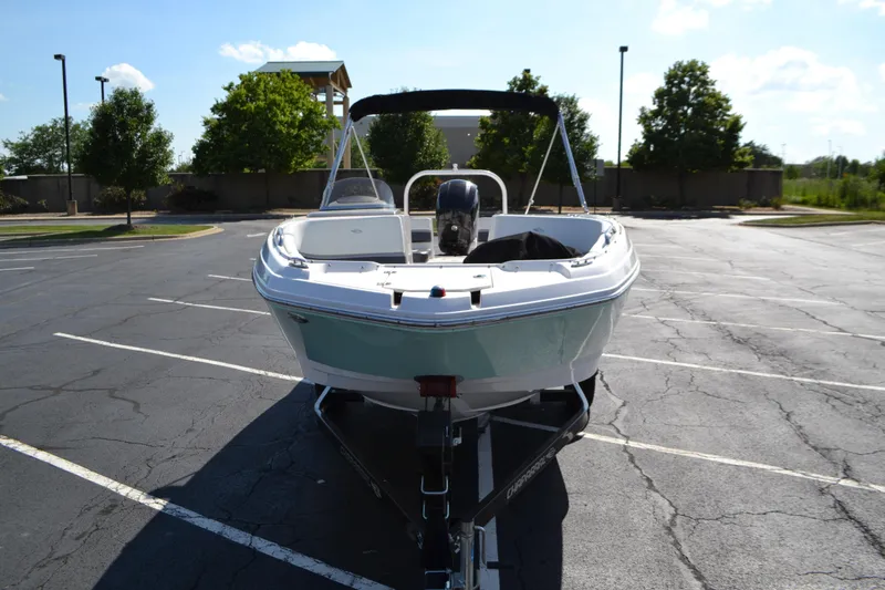 Slide: The Image of 2018 Chaparral 191 Suncoast boat on trailer in parking lot, sunny day. - 4