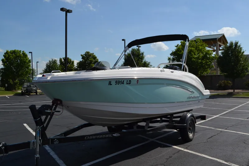 Slide: The Image of 2018 Chaparral 191 Suncoast boat on trailer in parking lot, sunny day. - 3