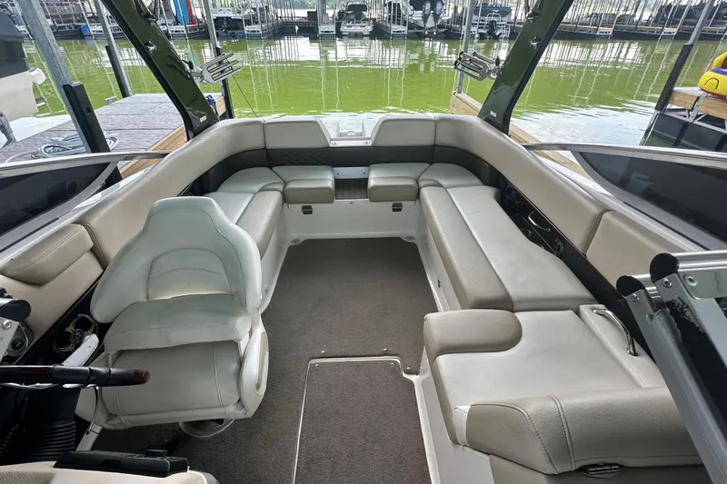 Slide: The Image of 2012 Regal 2300 RX Bowrider interior with spacious seating and modern design. - 6