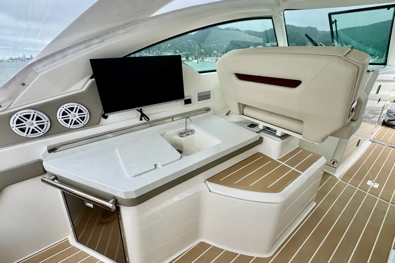 Slide: The Image of Luxurious interior of 2027 Tiara Yachts 34 LX with modern amenities and sleek design. - 15