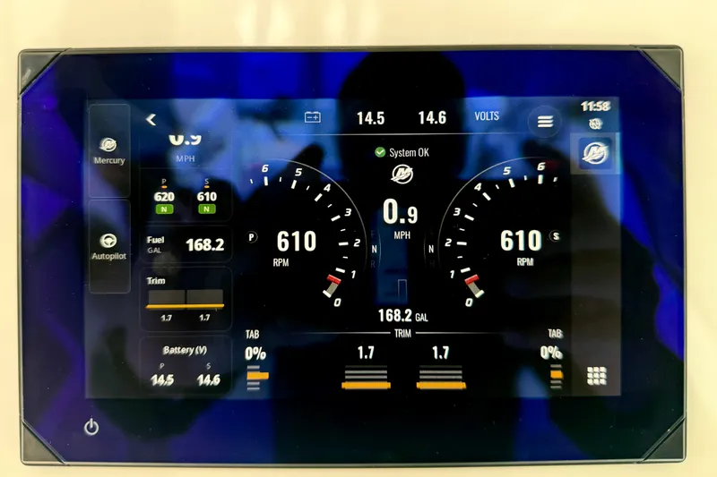 Slide: The Image of Dashboard display of 2027 Tiara Yachts 34 LX showing speed, RPM, and fuel levels. - 25