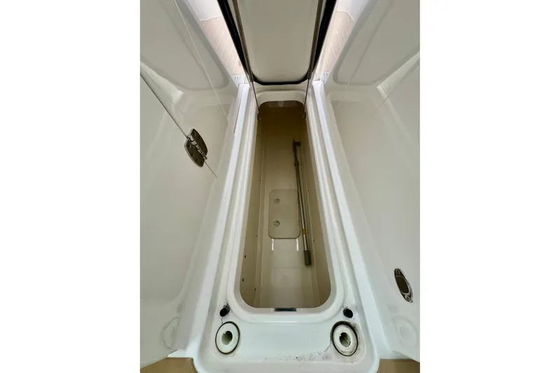 Slide: The Image of Storage compartment on 2027 Tiara Yachts 34 LX, showcasing sleek design and functionality. - 37
