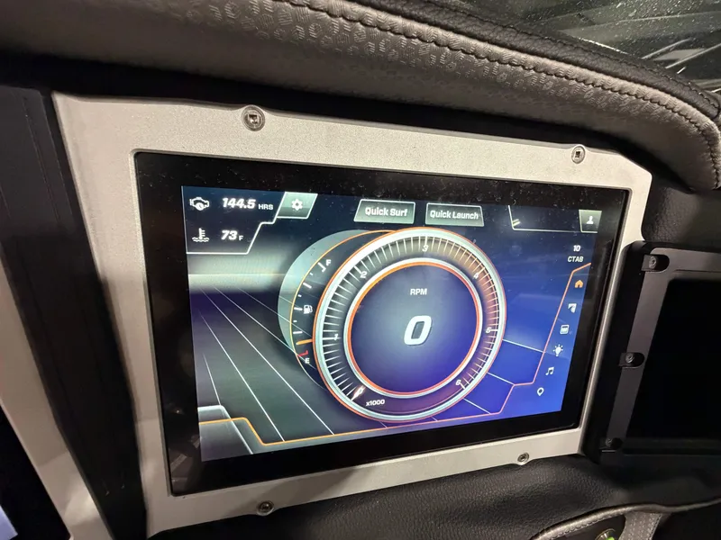 Slide: The Image of The image shows a modern digital dashboard with a tachometer and various control options. - 13