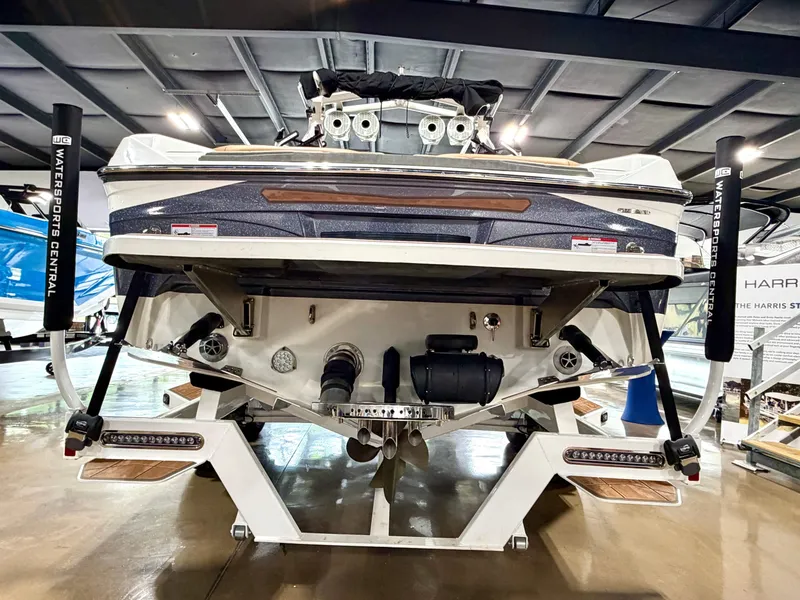 Slide: The Image of The image shows the rear of a 2022 Centurion Ri245 boat on a trailer. - 18