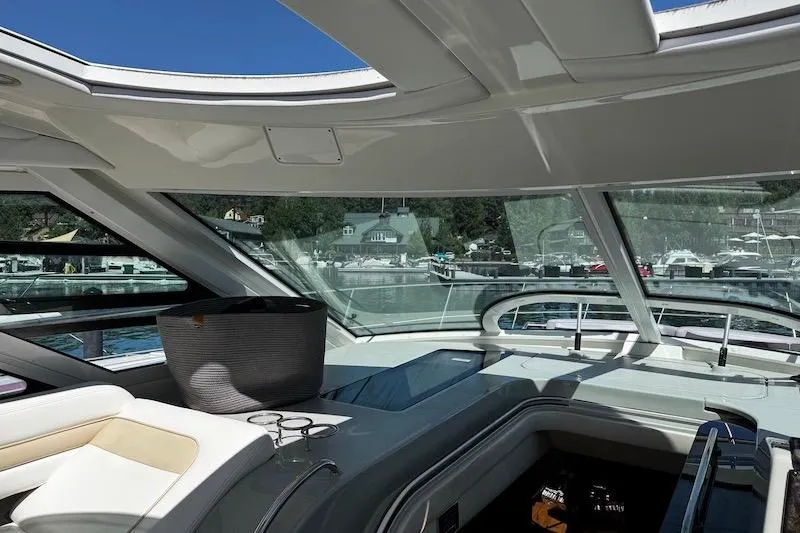 Slide: The Image of Luxurious interior of a 2010 Sea Ray 470 Sundancer yacht with panoramic windows. - 20