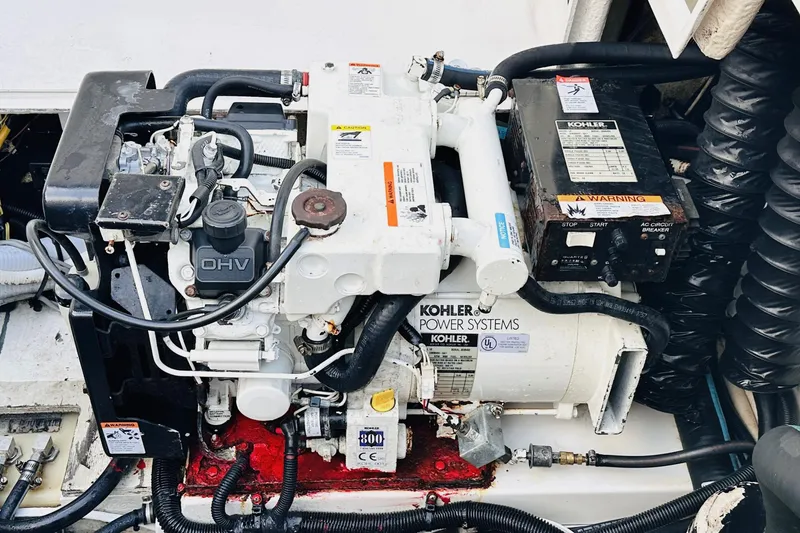 Slide: The Image of Engine compartment of a 2006 Monterey 298SC Super Sport with Kohler power system. - 14