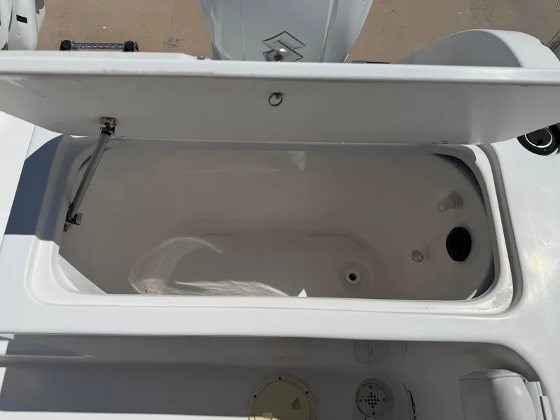 Slide: The Image of An open storage compartment on a 2002 PRO SPORT PRO KAT 2200 boat. - 33