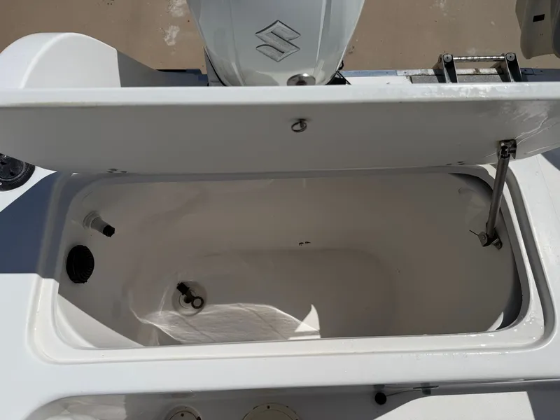 Slide: The Image of An open storage compartment on a 2002 PRO SPORT PRO KAT 2200 boat. - 34