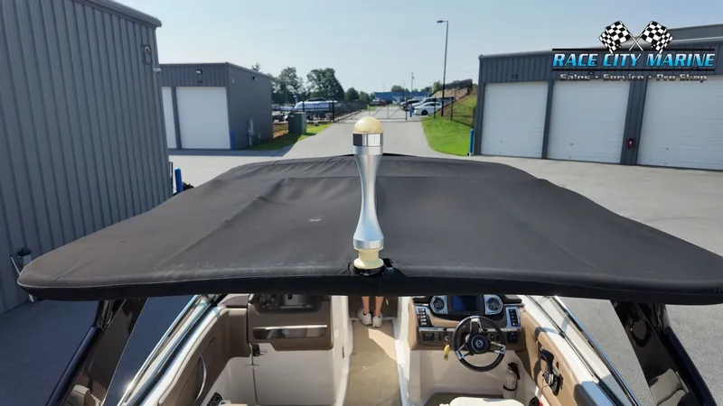 Slide: The Image of The image shows the cockpit of a 2015 Chaparral 277 SSX with a black canopy. - 29