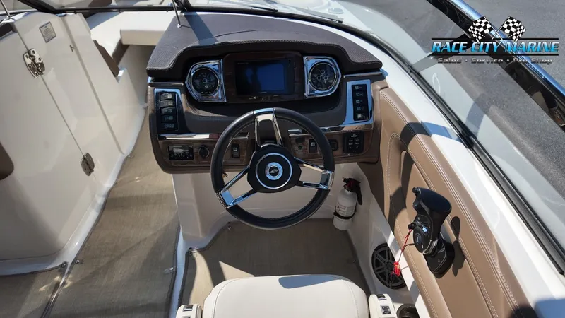 Slide: The Image of The image shows the cockpit of a 2015 Chaparral 277 SSX with a modern dashboard. - 39