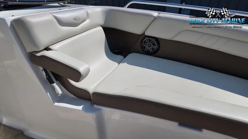 Slide: The Image of The image shows a cushioned bench seat in a boat with gray and brown upholstery. - 40