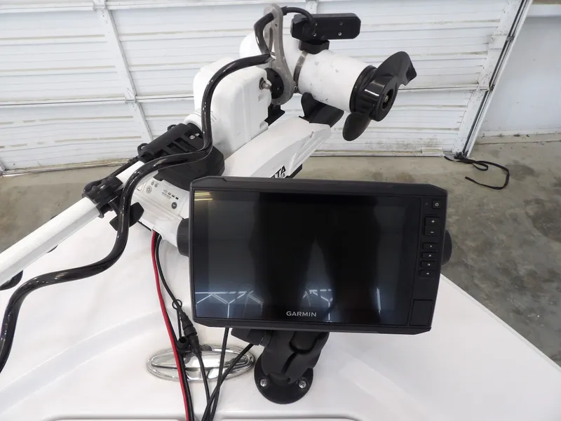 Slide: The Image of A Garmin fishfinder is mounted on a Sportsman Tournament 214 Bay Boat. - 10