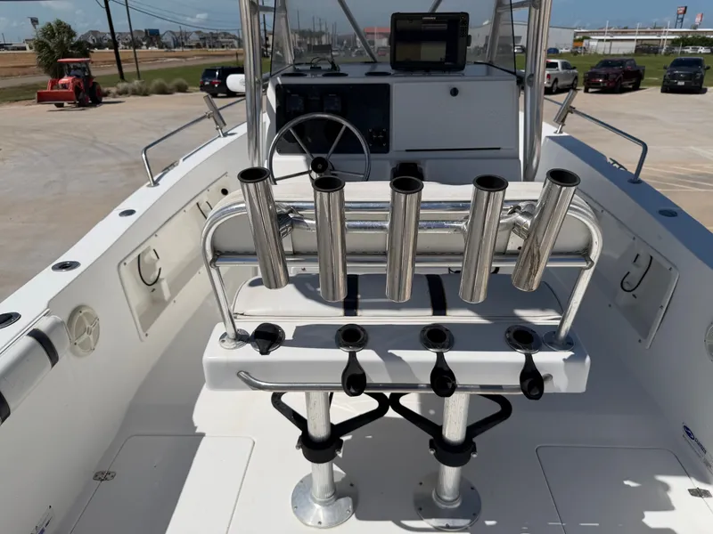 Slide: The Image of The image shows the cockpit of a 2002 PRO SPORT PRO KAT 2200 with fishing rod holders. - 24