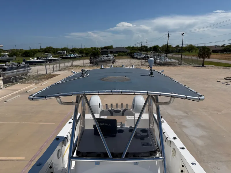 Slide: The Image of A 2002 PRO SPORT PRO KAT 2200 is parked in a lot. It features a large sunshade. - 18