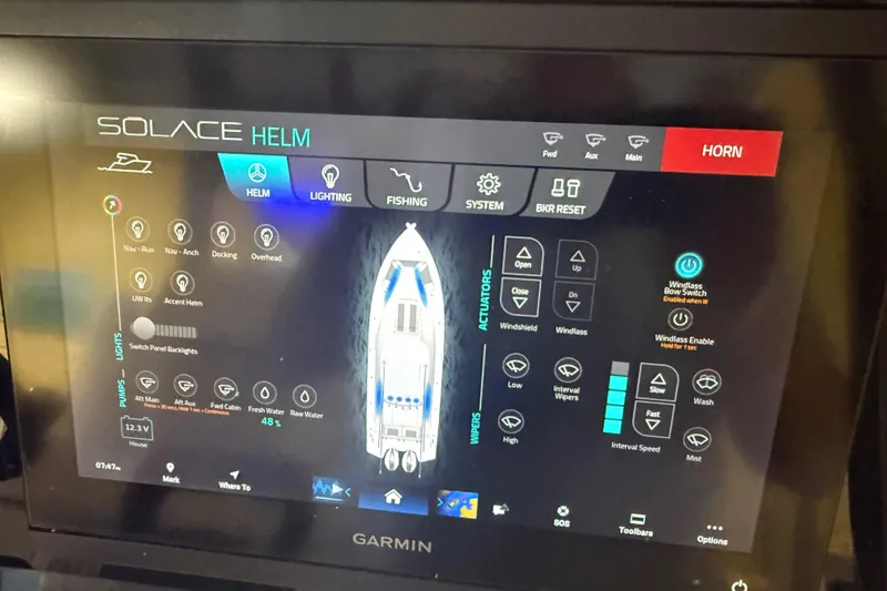 Slide: The Image of Touchscreen control panel of 2024 Solace 30HCS boat, displaying helm, lighting, and fishing options. - 13