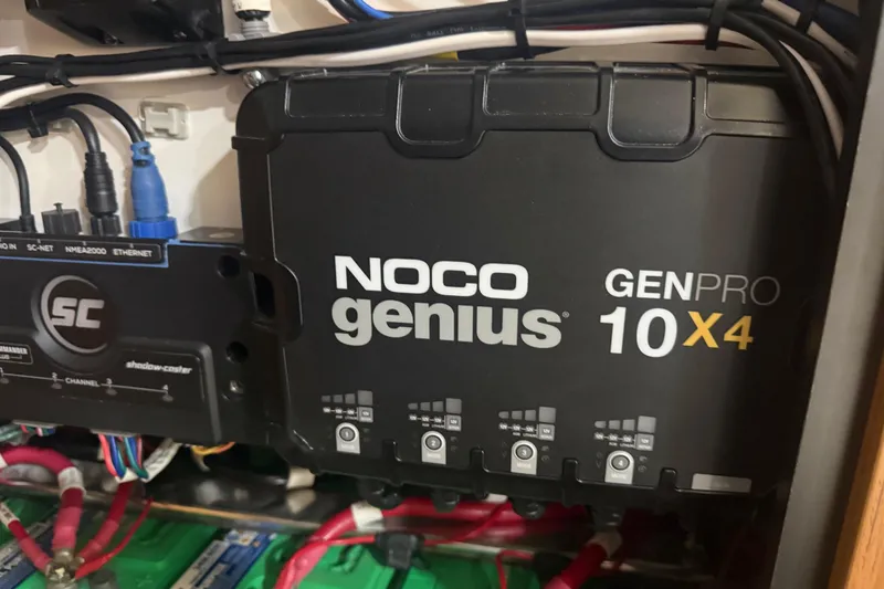 Slide: The Image of NOCO Genius GENPRO 10X4 charger in Solace 30HCS 2024 model electrical setup. - 33