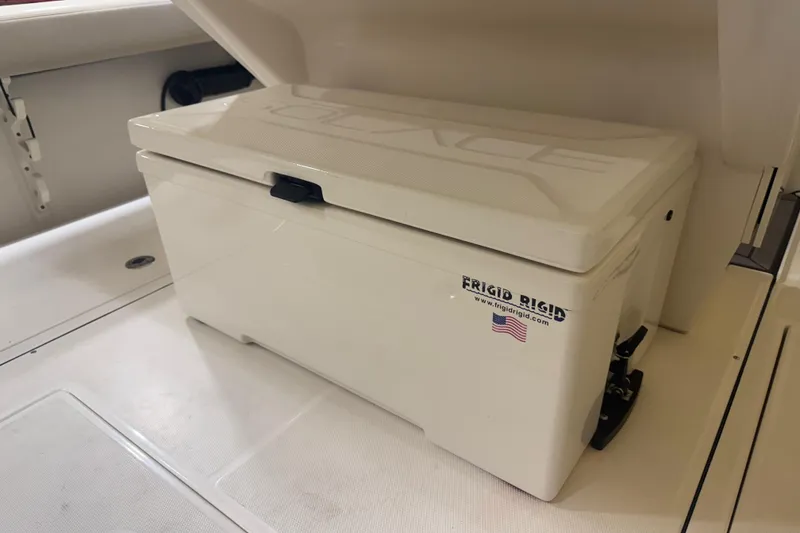 Slide: The Image of 2024 Solace 30HCS boat with Frigid Rigid cooler on deck. - 19