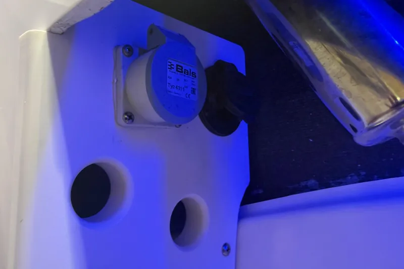Slide: The Image of Electrical outlet on 2024 Solace 30HCS boat, featuring Bals Typ 4311 connector. - 42