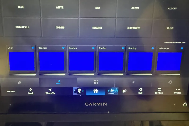 Slide: The Image of Touchscreen control panel of a 2024 Solace 30HCS boat, displaying lighting and system options. - 49