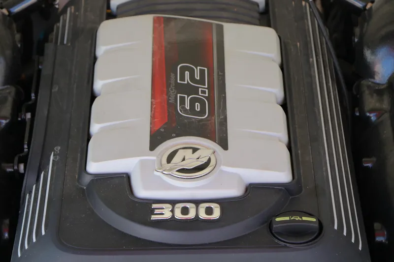 Slide: The Image of Close-up of a 2022 Crownline Eclipse E255 engine, featuring a 6.2L MerCruiser 300 horsepower. - 37