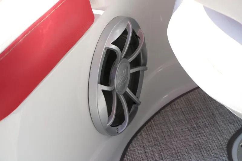 Slide: The Image of 2022 Crownline Eclipse E255 boat speaker with red upholstery and gray carpet. - 43