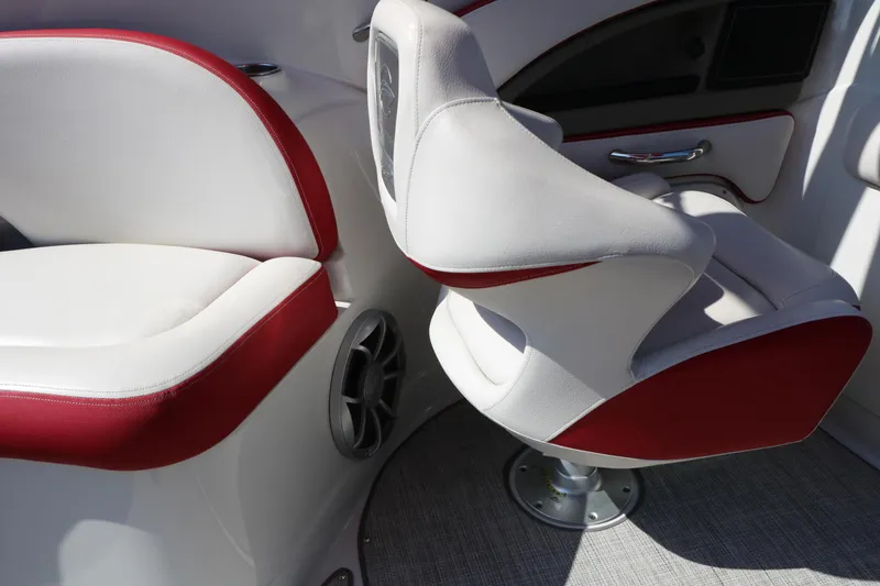 Slide: The Image of 2022 Crownline Eclipse E255 boat interior with red and white seating. - 42