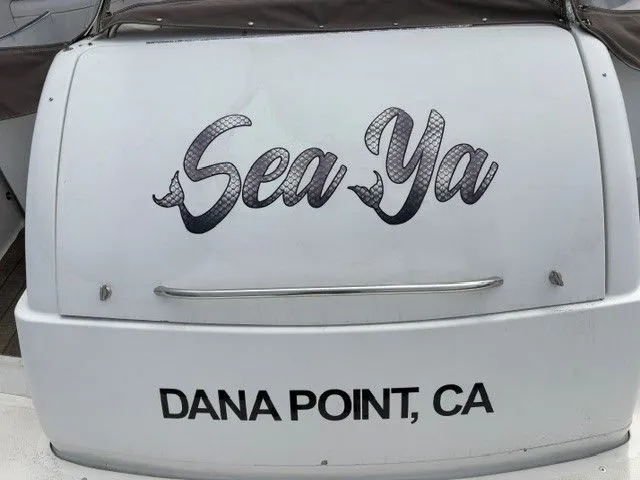 Slide: The Image of Stern of a boat named "Sea Ya" with location "Dana Point, CA". - 20
