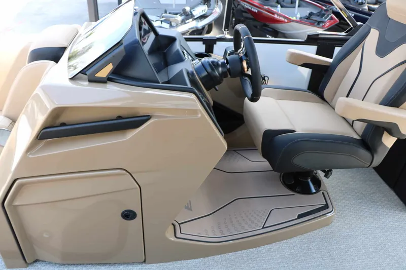 Slide: The Image of The image shows the cockpit of an Evotti 725 QL boat with a modern helm and comfortable seat. - 42