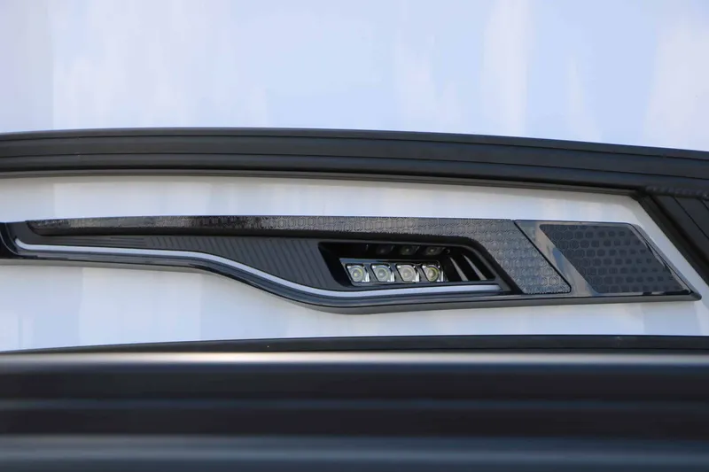 Slide: The Image of Close-up of a modern boat headlight with sleek design and LED lights. - 7