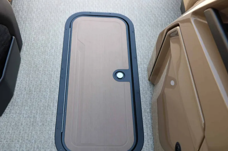 Slide: The Image of A sleek floor with a rectangular access panel in a modern boat. - 43