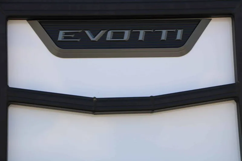 Slide: The Image of Close-up of the Evotti logo on a boat. - 6