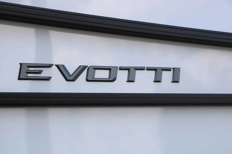 Slide: The Image of Close-up of the Evotti logo on a boat. - 9