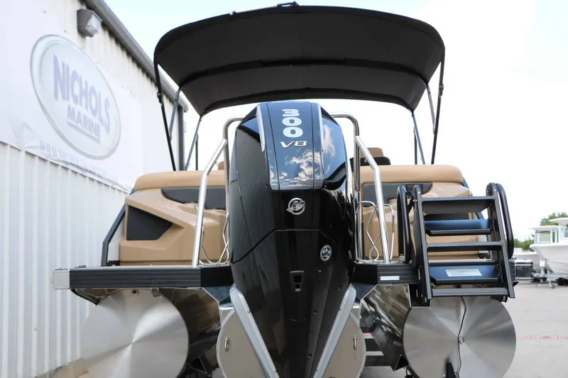 Slide: The Image of The image shows a modern pontoon boat with a powerful outboard motor. - 19