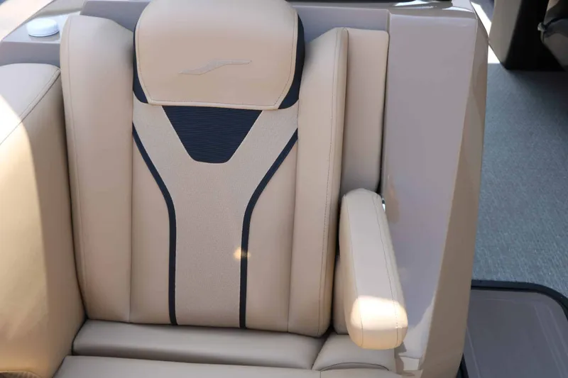 Slide: The Image of Beige boat seat with blue accents and armrest, stylish and modern design. - 32