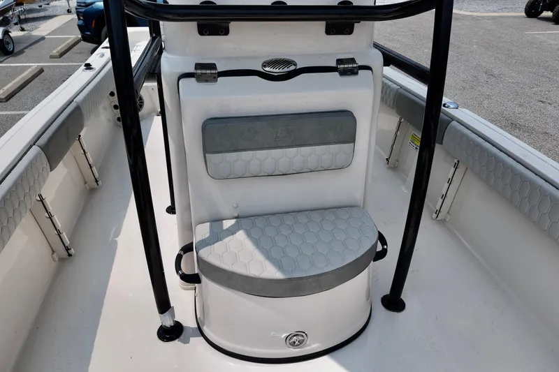 Slide: The Image of 2027 Carolina Skiff 21 Ultra Elite boat interior with seating and storage. - 10
