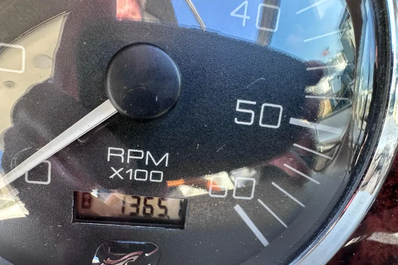 Slide: The Image of Close-up of 2003 Sea Ray Sundancer 280 RPM gauge showing 1365 RPM. - 25