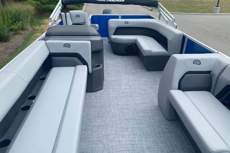 Slide: The Image of 2026 Sun Tracker Party Barge 18 DLX interior with spacious seating and modern design. - 4