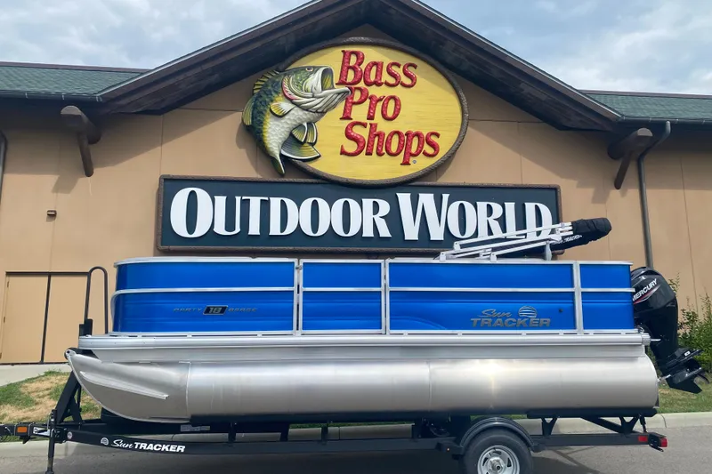 The Image of 2026 Sun Tracker Party Barge 18 DLX pontoon boat at Bass Pro Shops Outdoor World. - 0