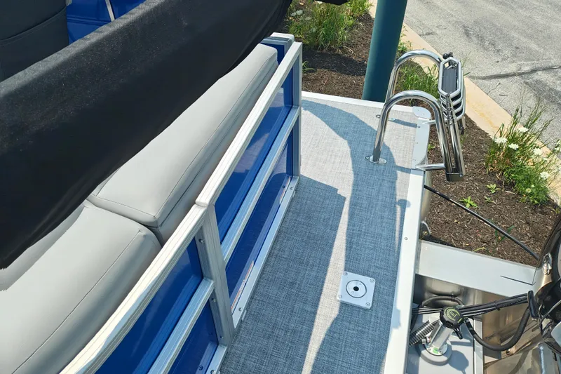 Slide: The Image of 2026 Sun Tracker Party Barge 20 DLX pontoon boat with seating and stainless steel ladder. - 20